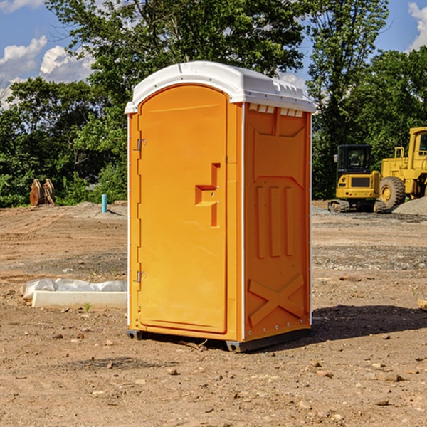 how often are the portable toilets cleaned and serviced during a rental period in Racine County